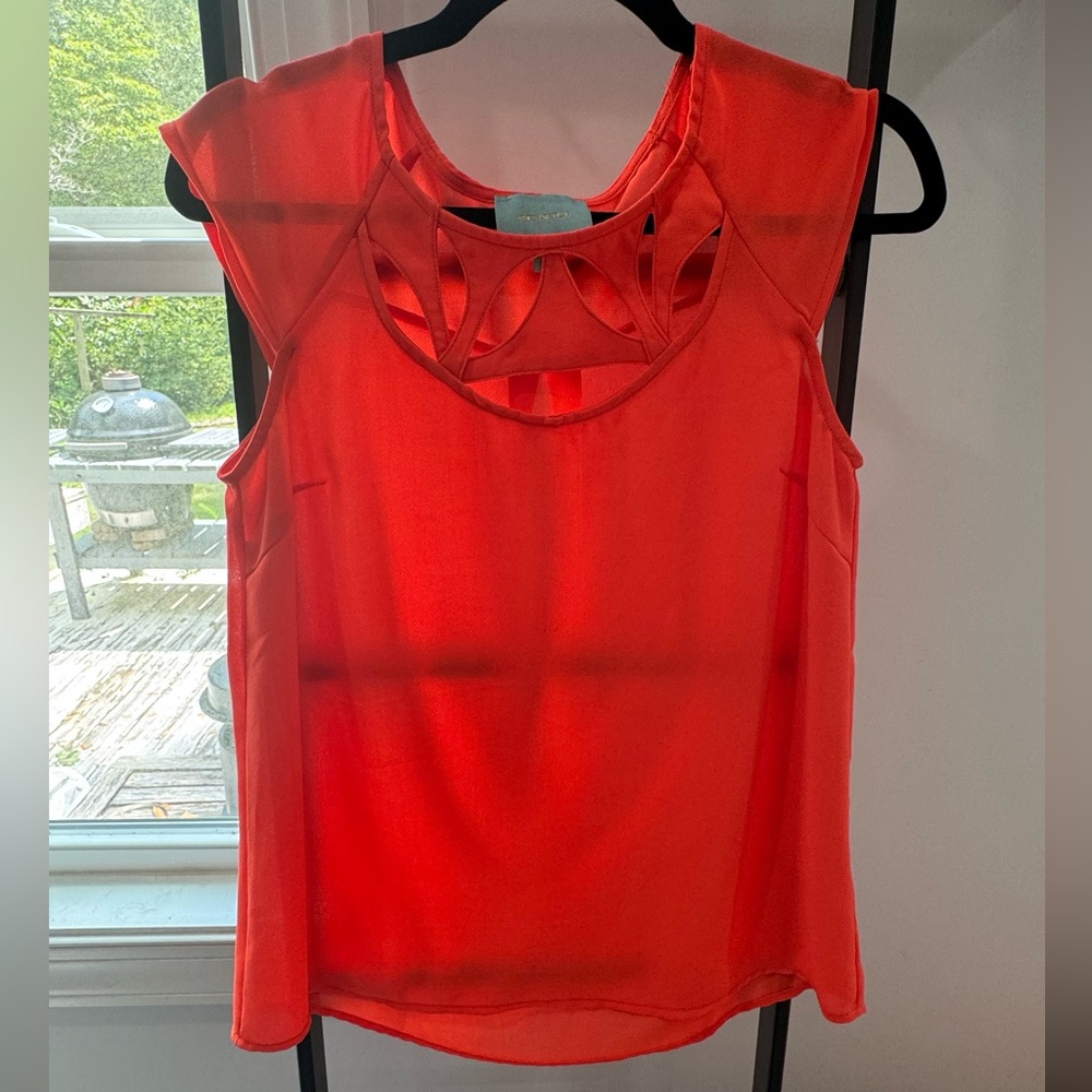 Pinkish orange blouse
